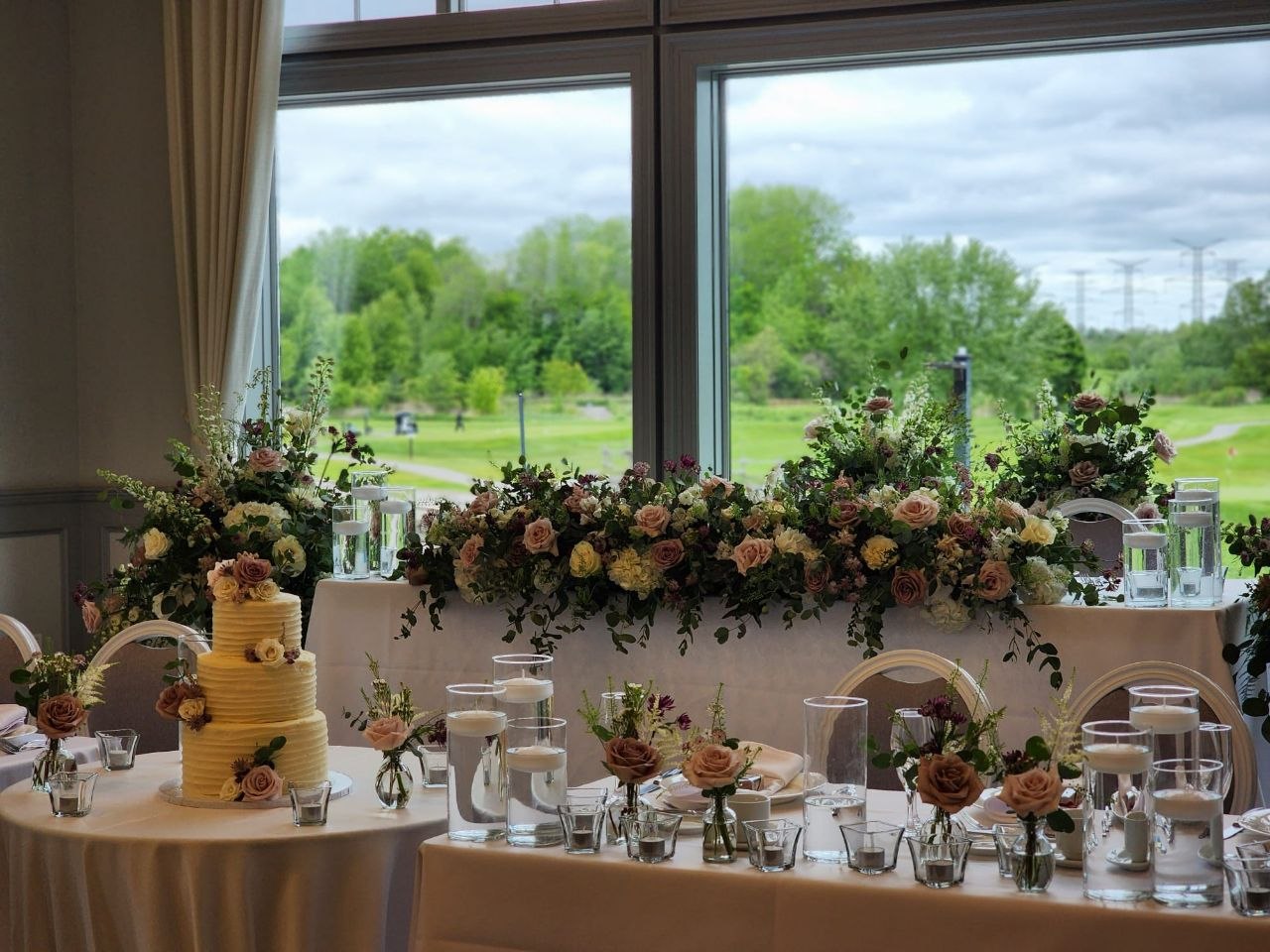 wedding reception flowers centrepieces floral arch Durham Region Bita Floral Whitby installation